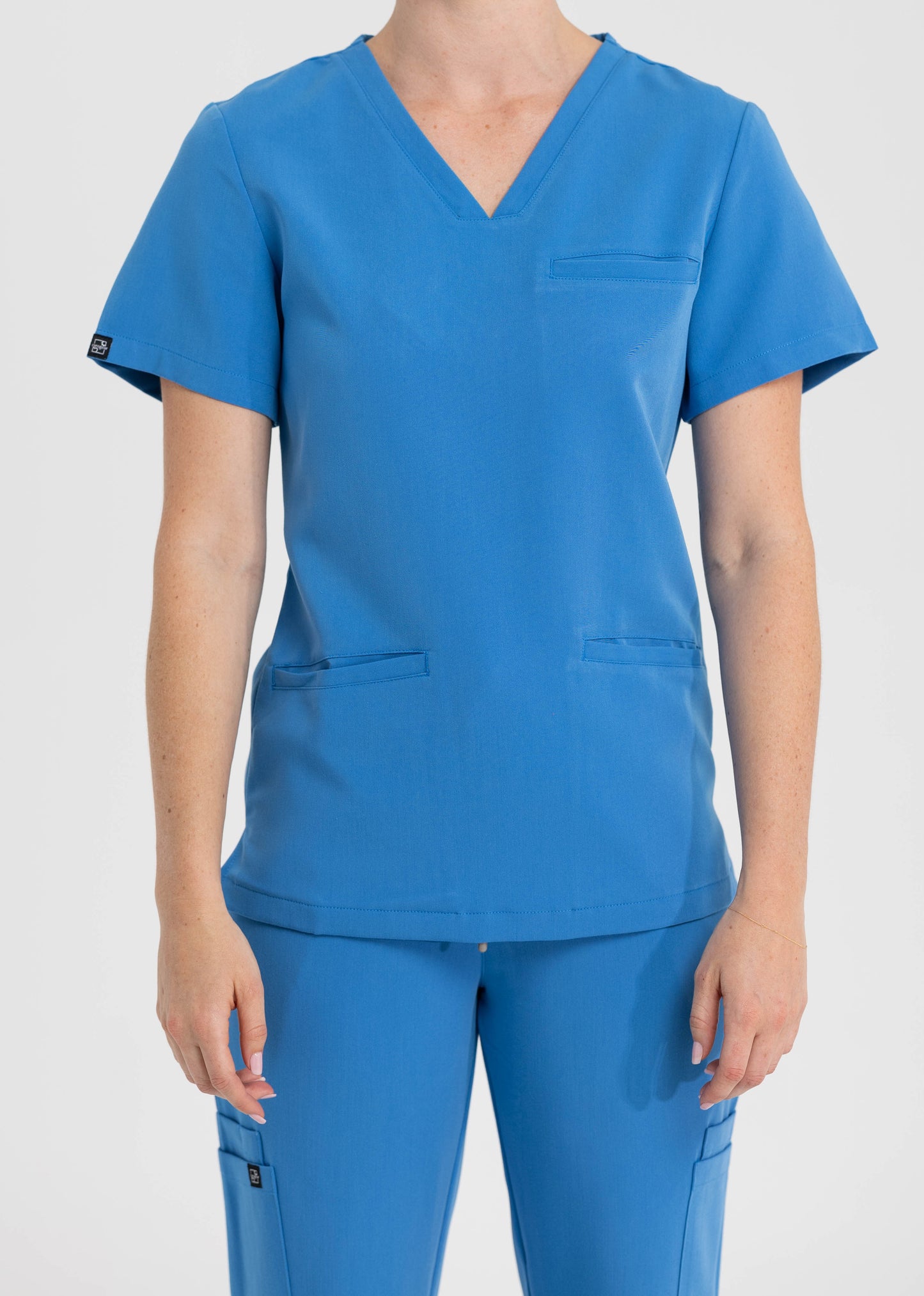 Women's V Neck Scrub Top with 3 pockets in Azure Blue