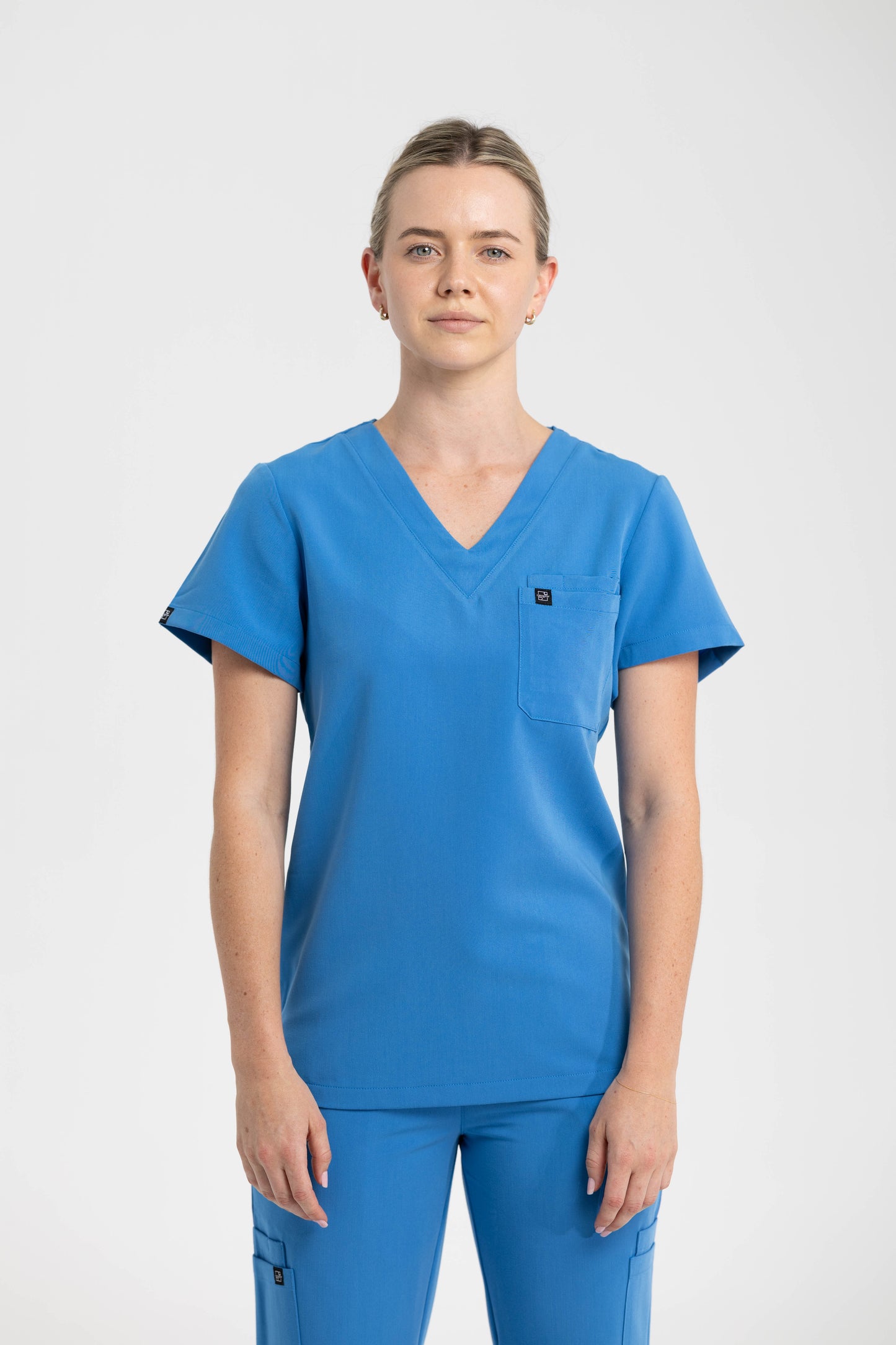 Women's V Neck Scrub top with Chest Pockets in Azure Blue
