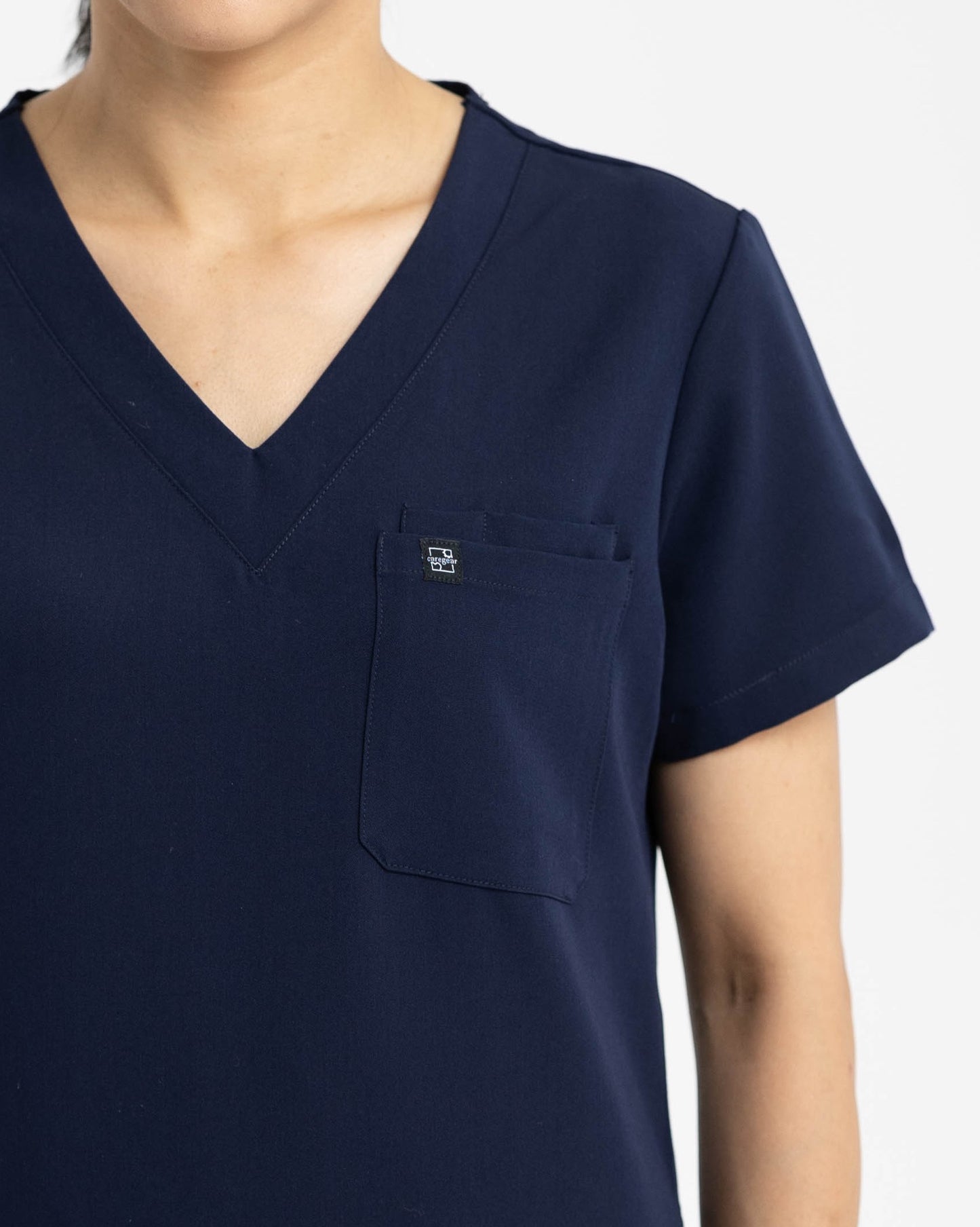 Women's V Neck Scrub top with Chest Pockets in Navy Blue