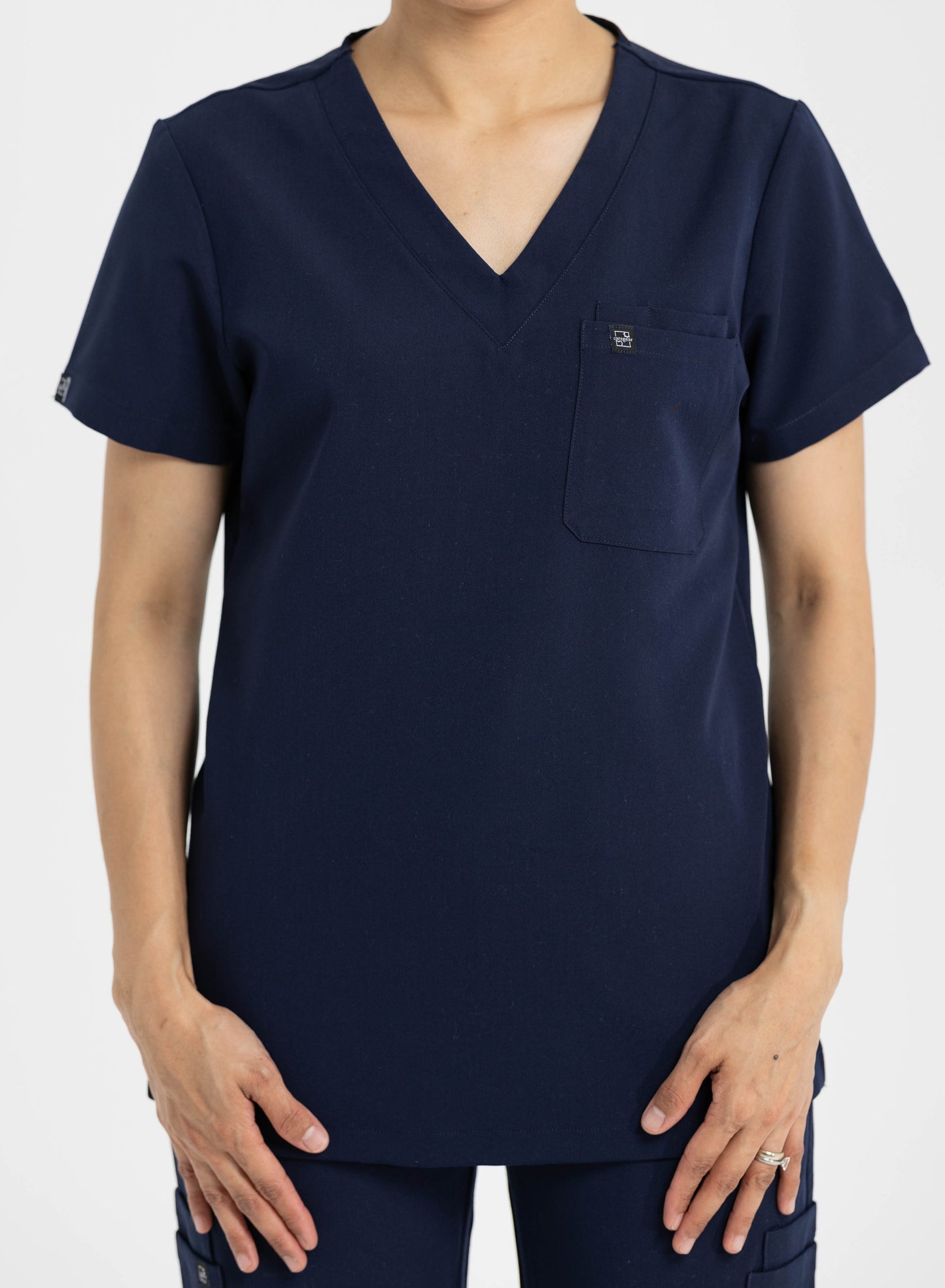 Women's V Neck Scrub top with Chest Pockets in Navy Blue