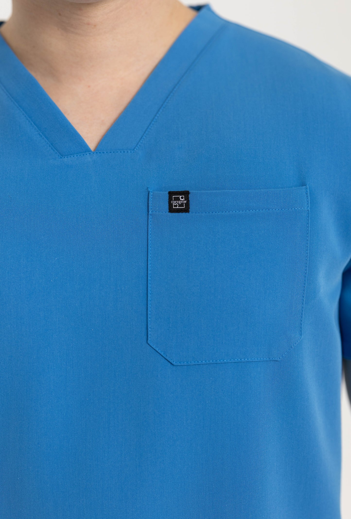 Men's V Neck Scrub Top with Three Pockets in Azure Blue