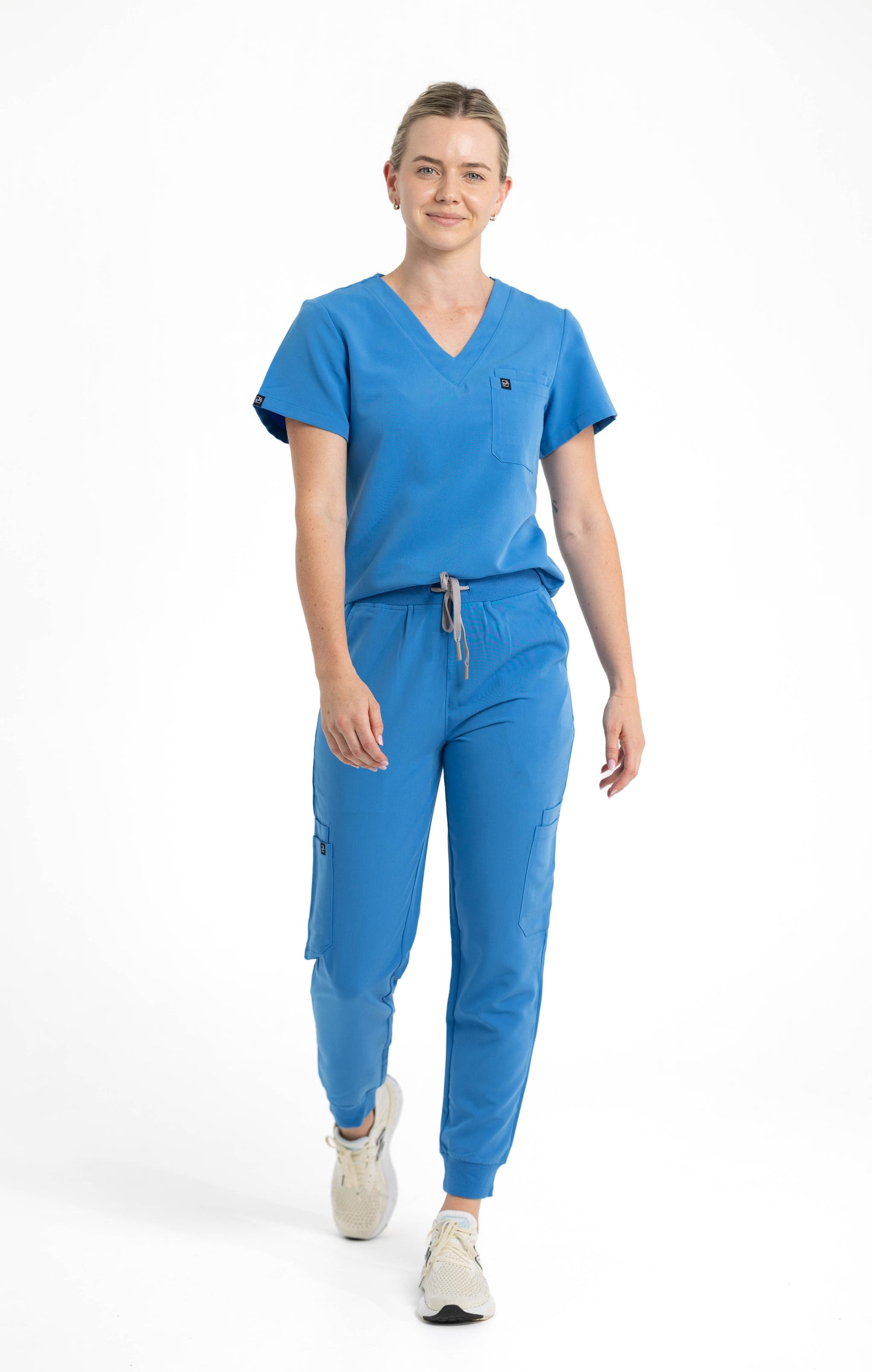 Women's V Neck Scrub top with Chest Pockets in Azure Blue